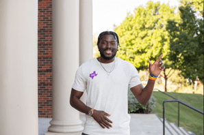 Christlieb Scholarship recipient, Cedric, posing on campus